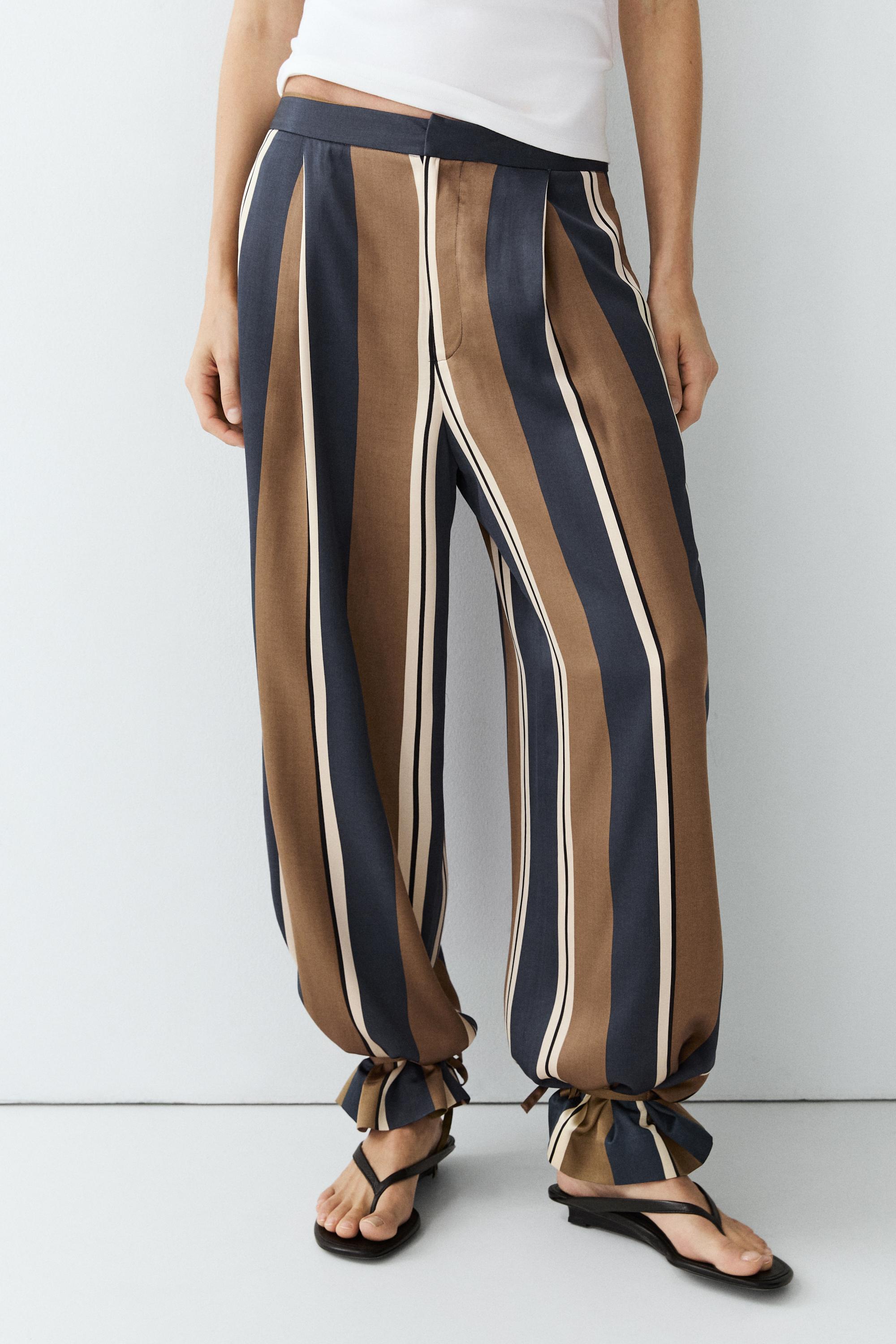 Satin pants with tie-up hem detail